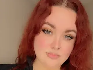 RedheadedBust  live sex cam