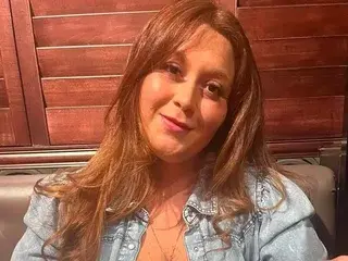 BustyRedwGlasses  live sex cam